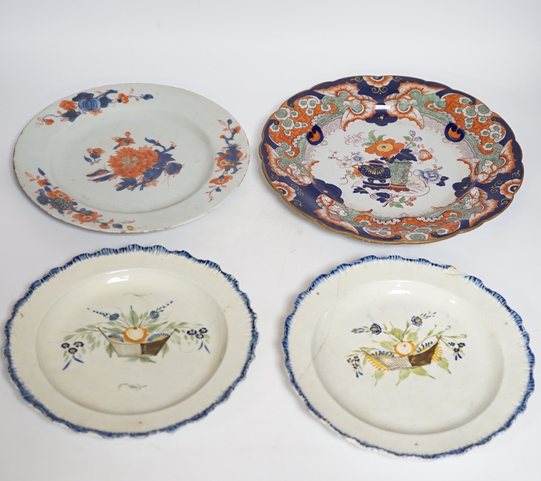 Two late 18th century pearlware Prattware plates, a Chinese export plate and an ironstone plate, largest 27cm in diameter